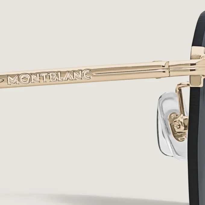 Runde Sonnenbrille mit goldfarbenem Metallrahmen